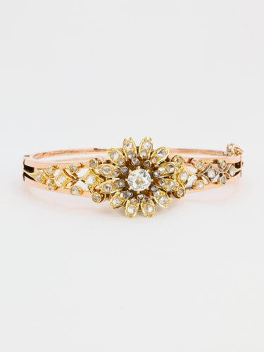 Bracelet Bracelet Napoléon III fleur mobile en or rose et diamants 58 Facettes 1085.3