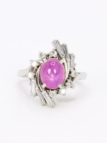 Bague 49.5 Bague marguerite en platine, rubis étoilé et diamants 58 Facettes 1131.2