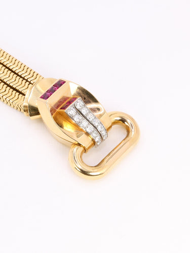 Montre UTI - Montre secrète tubogas en or jaune 18 carats, diamants et rubis calibrés 58 Facettes 1153.5