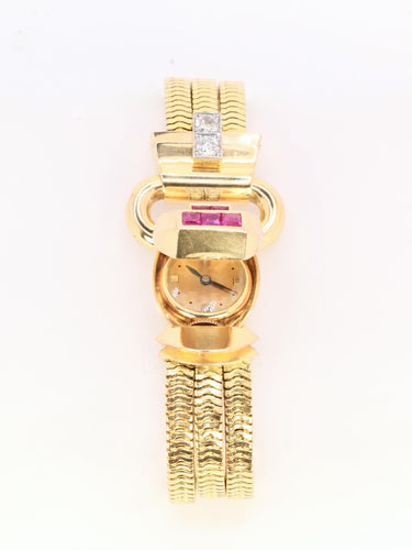 Montre UTI - Montre secrète tubogas en or jaune 18 carats, diamants et rubis calibrés 58 Facettes 1153.5