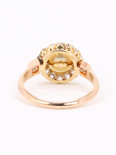 Bague 53 Bague marguerite ancienne en or rose 18 carats, perle et diamants 58 Facettes 1174.5