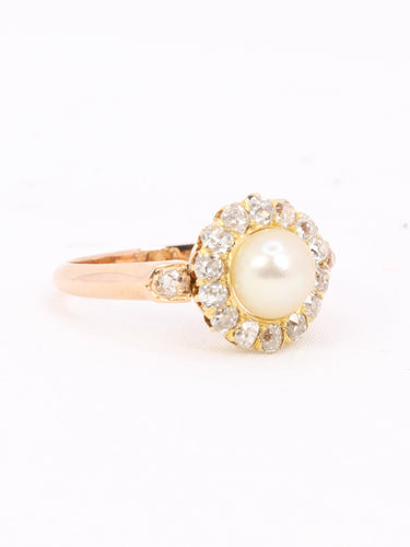 Bague 53 Bague marguerite ancienne en or rose 18 carats, perle et diamants 58 Facettes 1174.5