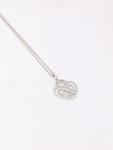 Collier Poiray - Collier cœur entrelacé en or blanc 18K et diamants 58 Facettes 1091.1