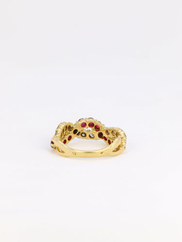 Bague 52 Bague vintage torsadée en or jaune 18 carats, diamants et rubis 58 Facettes 825