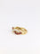 Bague 52 Bague vintage torsadée en or jaune 18 carats, diamants et rubis 58 Facettes 825