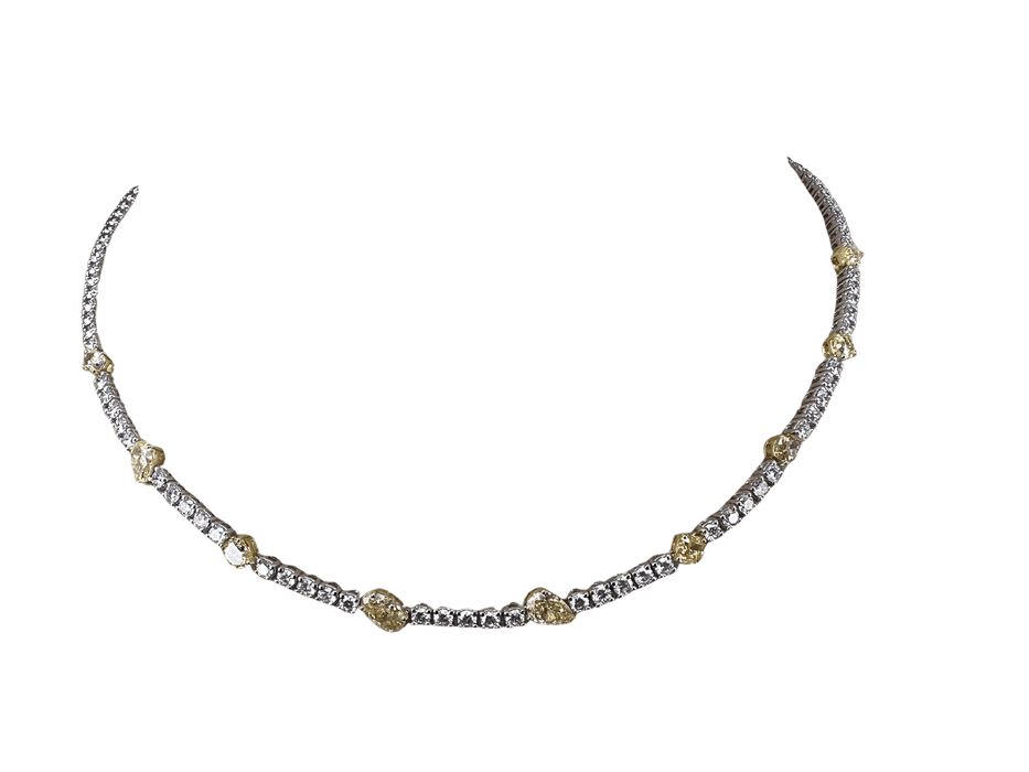 Collier Collier tennis en or blanc 18 carats avec diamants jaunes 58 Facettes G-439