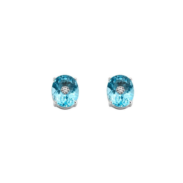 Boucles d'oreilles Paire de boutons d'oreilles en or blanc ornées de 2 topazes et 2 diamants 58 Facettes