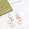 Boucles d'oreilles Van Cleef & Arpels Magic Alhambra - Boucles d’oreilles 4 motifs en or jaune et nacre 58 Facettes