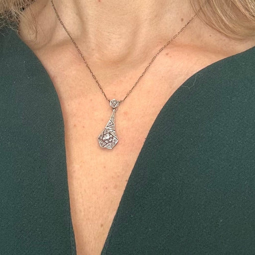 Pendentif Pendentif en platine et or blanc 750 serti de diamants 58 Facettes Z1351631