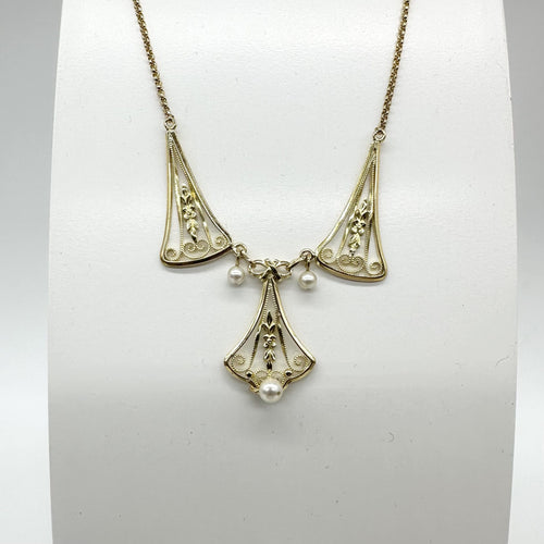 Collier Collier filigrane en or jaune 750 avec perles de culture 58 Facettes Z1351770