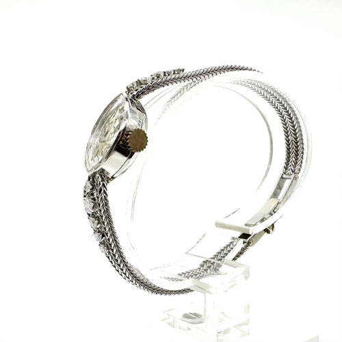 Montre Montre femme en or blanc 750 ornée de diamants (1970) 58 Facettes Z15B51480