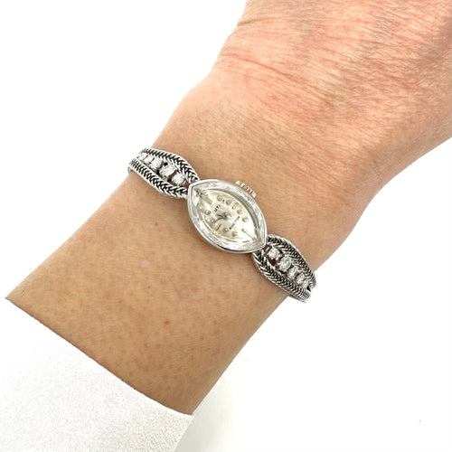Montre Montre femme en or blanc 750 ornée de diamants (1970) 58 Facettes Z15B51480