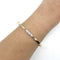 Bracelet Bracelet jonc trilogie bicolore en or jaune et or blanc 750, diamants 58 Facettes Z15B51581