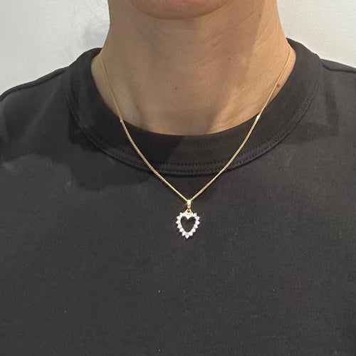 Pendentif Pendentif cœur en or jaune 18 carats et diamants 58 Facettes Z15B51681
