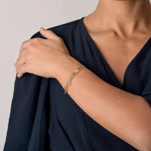 Bracelet CARTIER - Double C vintage en or jaune et diamants 58 Facettes DDV19270-1