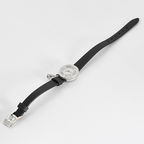 VAN CLEEF & ARPELS - Montre en or blanc et diamants à boitier rond et mouvement quartz