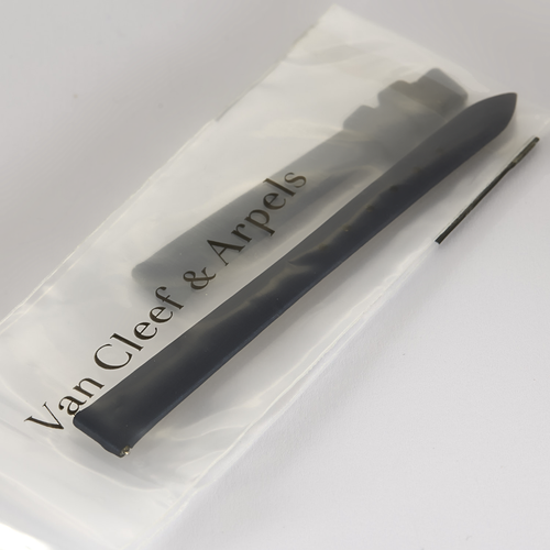 VAN CLEEF & ARPELS - Montre en or blanc et diamants à boitier rond et mouvement quartz