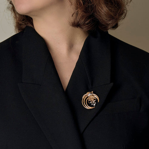 Broche Broche en or jaune et or gris, diamants 58 Facettes DV21132-2