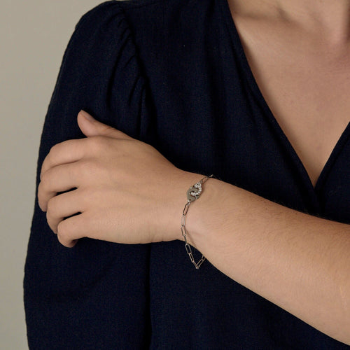 Bracelet Dinh Van Menottes R10 - Bracelet en or gris, Diamants 58 Facettes DV21154-1