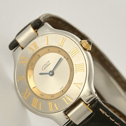 Montre CARTIER - Must 21 - Montre en acier et métal doré 58 Facettes DV21612-1