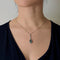 Collier Collier en or gris, aigue-marine et diamants 58 Facettes DV21730-1