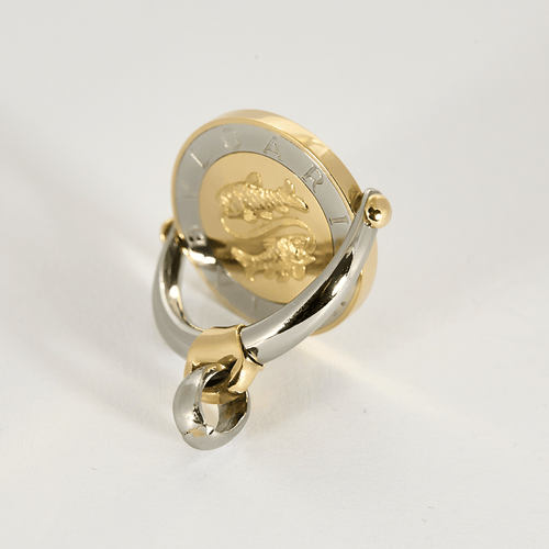 BULGARI - TONDO Zodiaque - Pendentif en or jaune et acier.