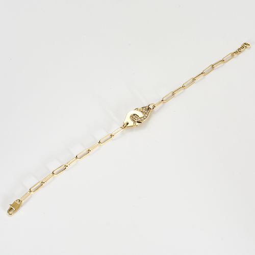 Dinh Van Menottes R10 Bracelet en or jaune et diamants