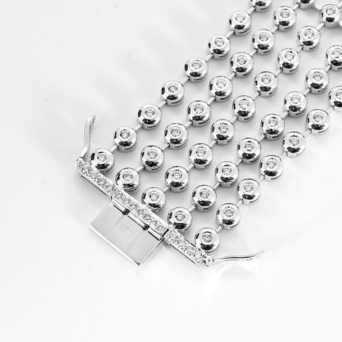 Bracelet Bracelet ruban en or gris et diamants 58 Facettes DV22966-1