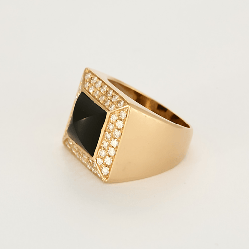 Bague chevalière en or rose, pierre noire et diamants