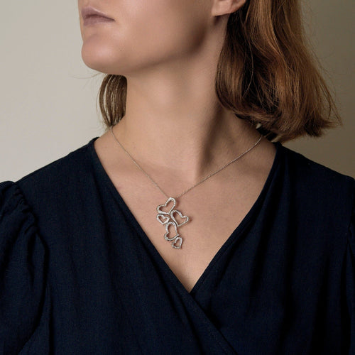 Collier en or gris et pendentifs Coeurs diamants 58 Facettes DDV23962-2