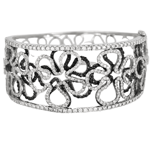 Bracelet Important Bracelet Camélia en or gris diamants blancs et diamants noirs 58 Facettes DDV21423-1