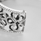 Bracelet Important Bracelet Camélia en or gris diamants blancs et diamants noirs 58 Facettes DDV21423-1