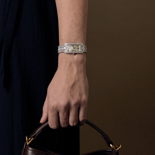 Montre Cartier - Tank Américaine - Montre en or blanc et diamants 58 Facettes DV25042-1