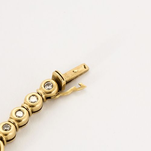 Bracelet en or jaune, diamants et émeraudes 58 Facettes DV22637-3