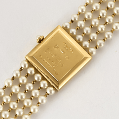 Montre CHANEL - Mademoiselle - Montre bijou or jaune et perles 58 Facettes DV23243-1