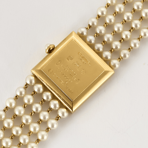 Montre CHANEL - Mademoiselle - Montre bijou or jaune et perles 58 Facettes DV23243-1