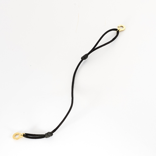 DINH VAN - Serrure - Bracelet Menotte R8 en or jaune. Cordon noir.