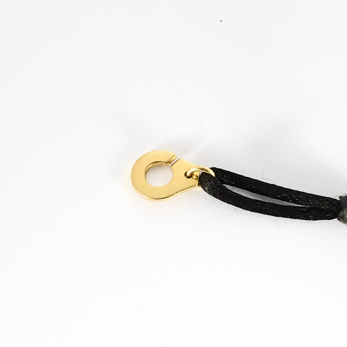 DINH VAN - Serrure - Bracelet Menotte R8 en or jaune. Cordon noir.