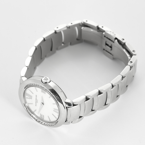 Baume et Mercier - Montre de dame en acier et diamants