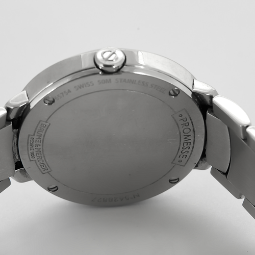 Baume et Mercier - Montre de dame en acier et diamants