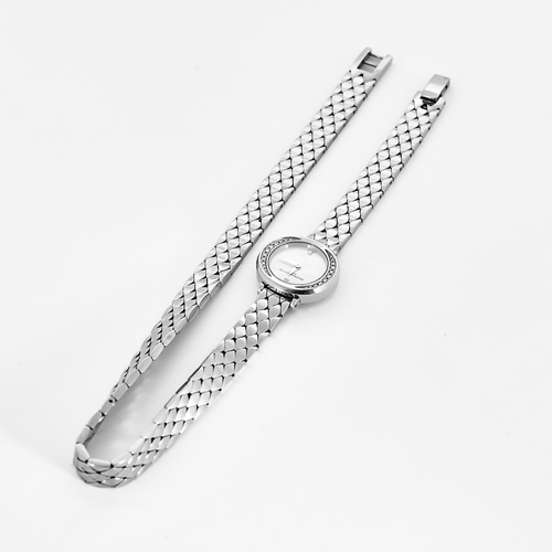 Montre BAUME & MERCIER - Petite Promesse - Montre en acier à boitier rond, mouvements quartz et diamants 58 Facettes DV26161-7