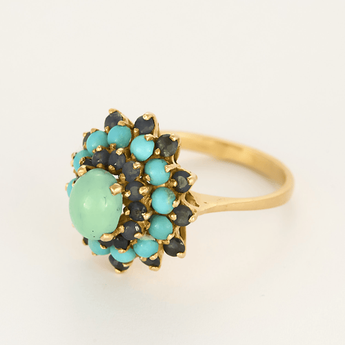 Bague en or jaune, saphir et turquoises
