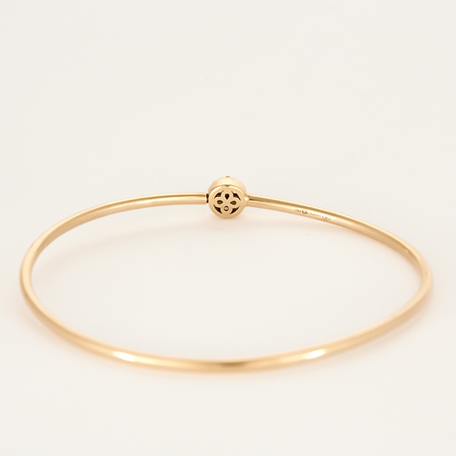 Bracelet Bracelet jonc en or jaune à motif floral 58 Facettes DV1838-13
