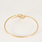 Bracelet Bracelet jonc en or jaune à motif circulaire ajouré 58 Facettes DV1838-14