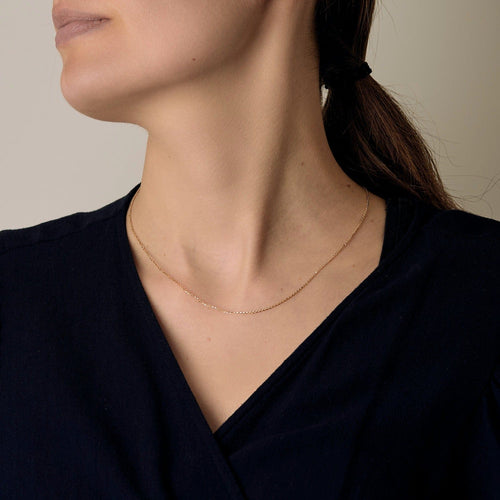 Collier Chaîne en or jaune à maille forçat 58 Facettes DV1838-7