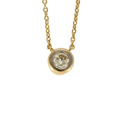 Collier solitaire en or jaune et or gris, diamant 0.15 carat environ.