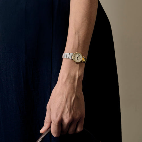 Montre VAN CLEEF & ARPELS - Montre en acier et acier plaqué or à boitier rond et mouvement quartz 58 Facettes DV11451-21