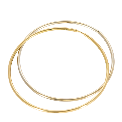 Deux bracelets jonc en or jaune et or blanc