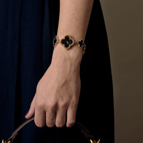 Montre VAN CLEEF & ARPELS - Alhambra - Montre bracelet de dame en or jaune et onyx 58 Facettes DV4391-3