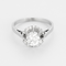 Bague solitaire en or gris et platine, diamant 0.90 carat environ.